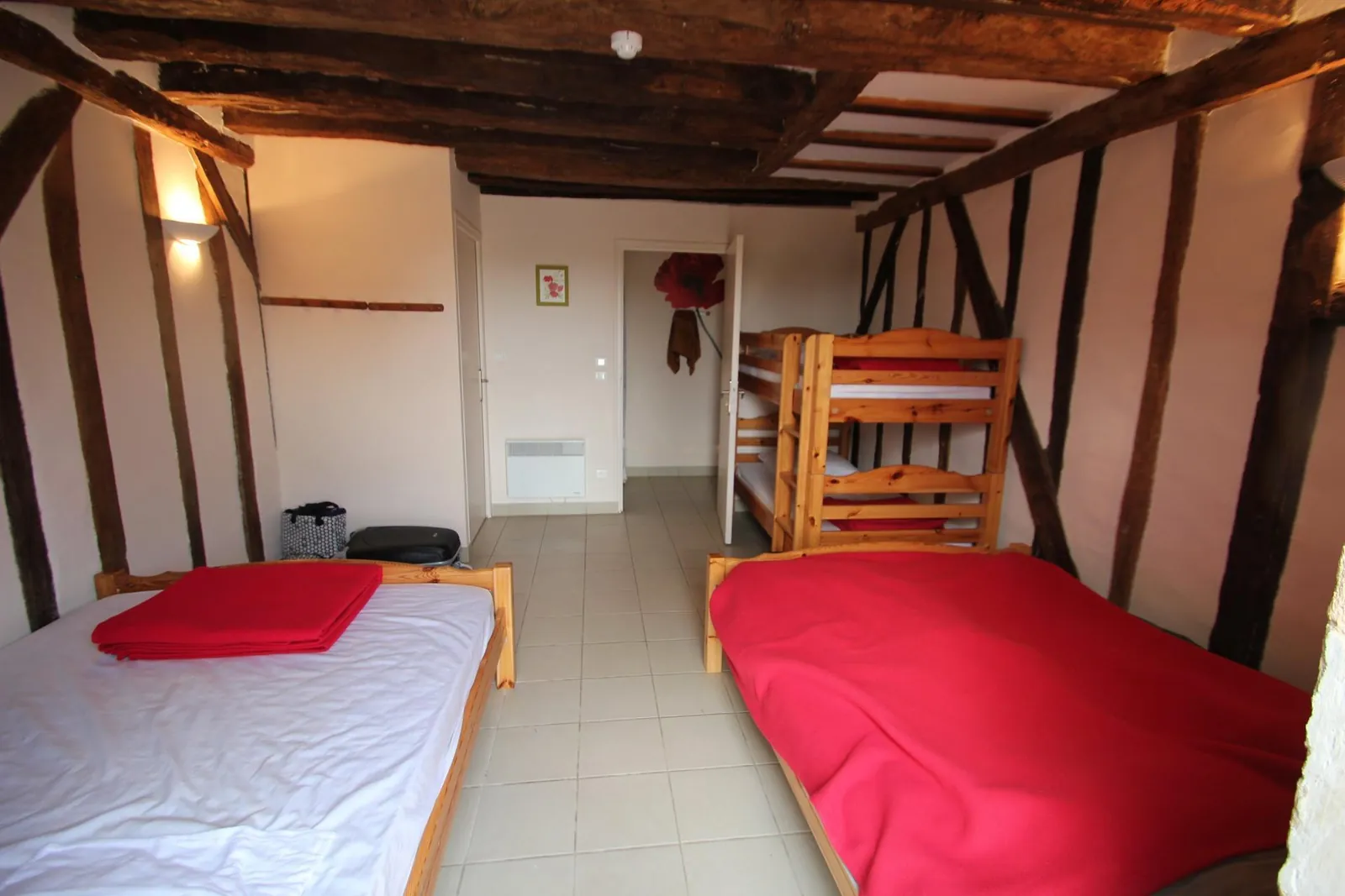 Chambre du gîte aux colombages